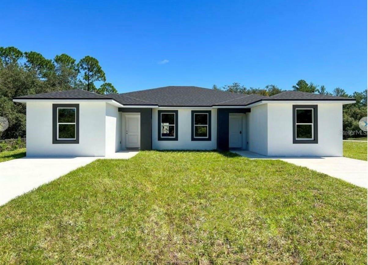 Property Photo: 9217 Tacoma Avenue 9219 FL 34224
