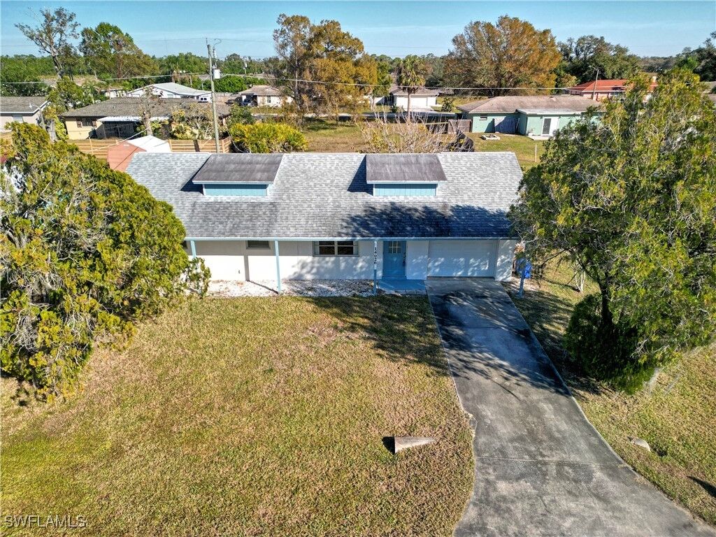 Property Photo:  14026 Caribbean Boulevard  FL 33905 