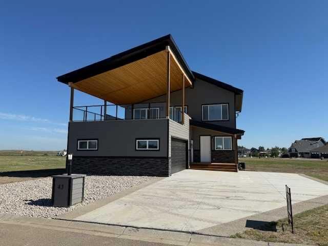 Property Photo: 43 Kingfisher Estates Drive AB T1R 0Y5