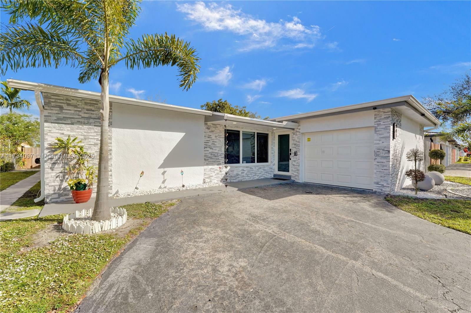 Property Photo:  941 NW 89th Ter  FL 33024 