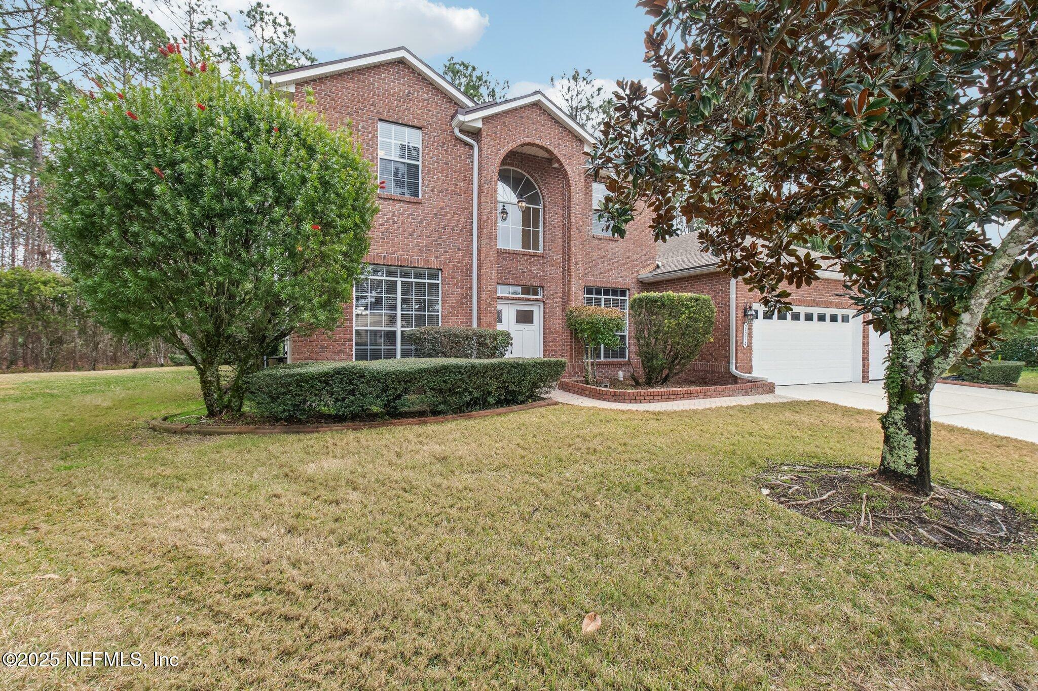 Property Photo:  2574 Whispering Pines Drive  FL 32003 