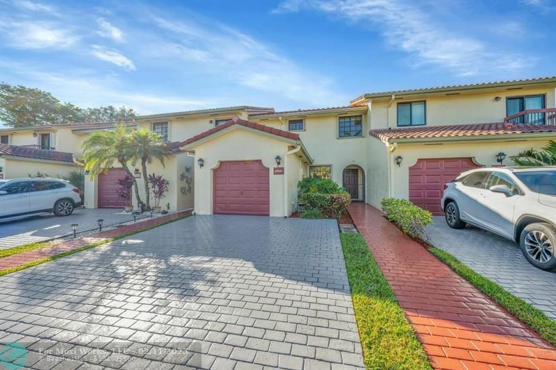 Property Photo:  9620 Alcazar Lane B  FL 33324 