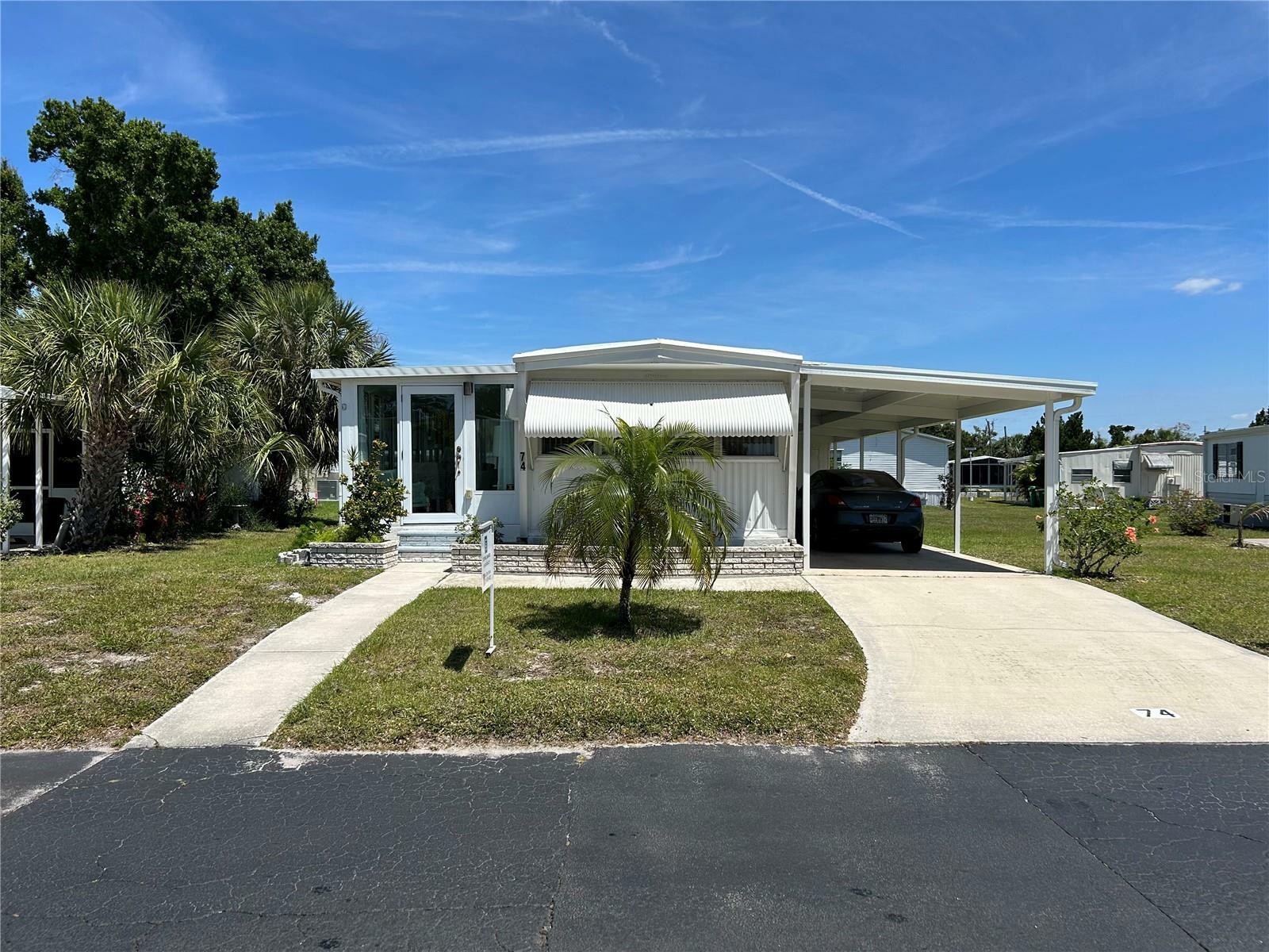 Property Photo:  24437 Harborview Road 74  FL 33980 