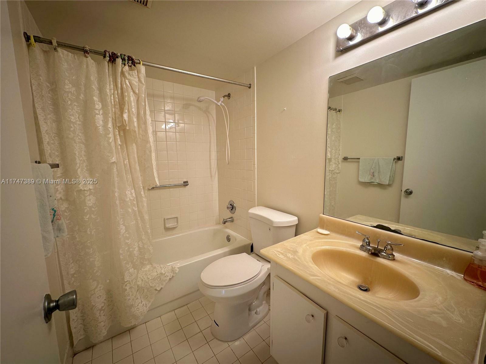 Property Photo:  850 SW 133rd Ter 201B  FL 33027 