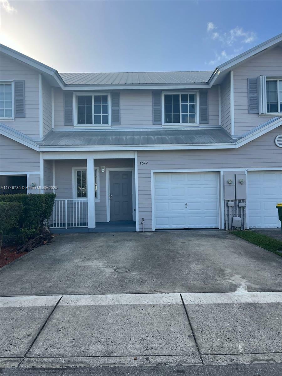 Property Photo:  1672 SE 9th Ave 1672  FL 33034 