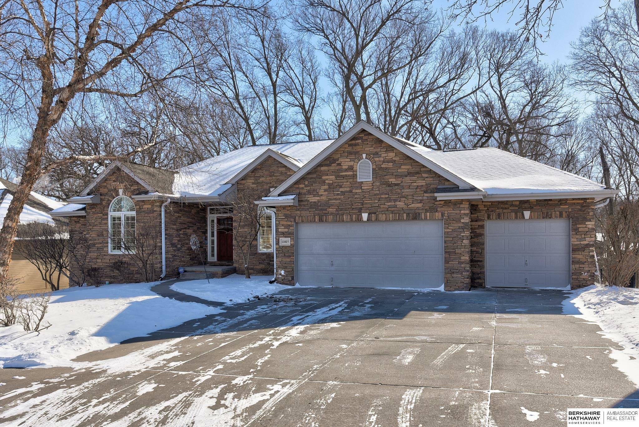 Property Photo: 11815 Windcrest Drive NE 68133
