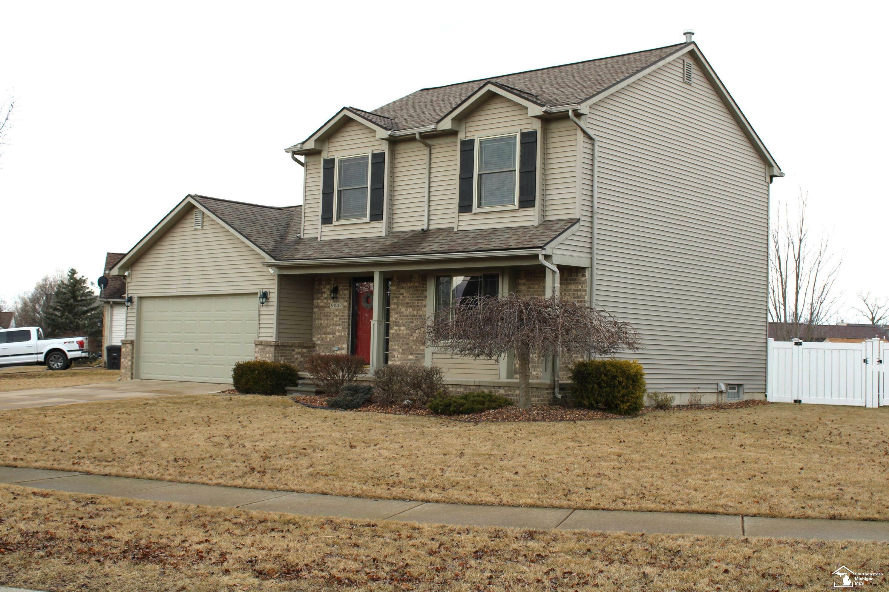 Property Photo:  9047 Rockhill Lane  MI 48166 