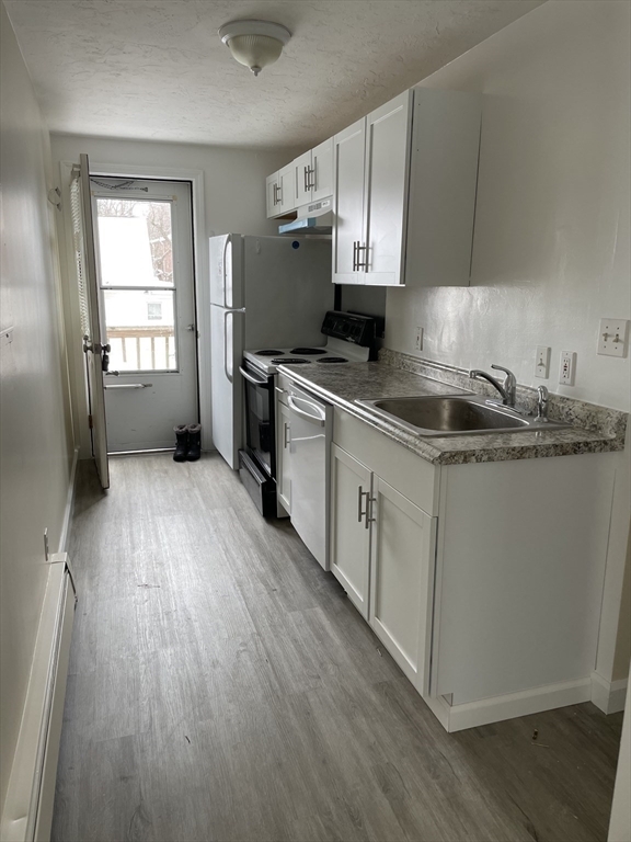 Property Photo: 20 Gibbon St 2R MA 01752