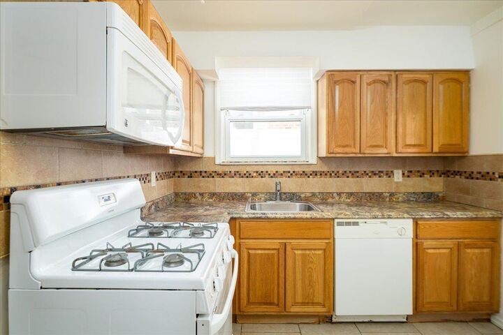 Property Photo:  95-14 157th Avenue  NY 11414 