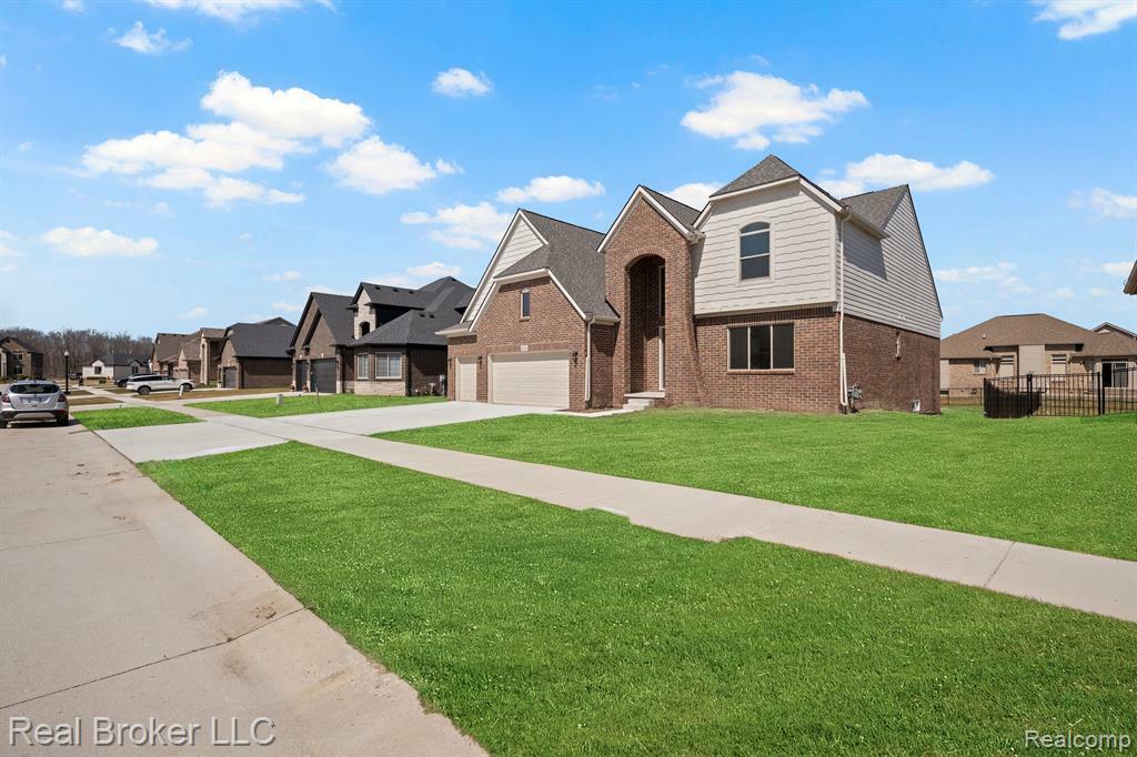 Property Photo: 35689 Windridge Drive MI 48047 5852