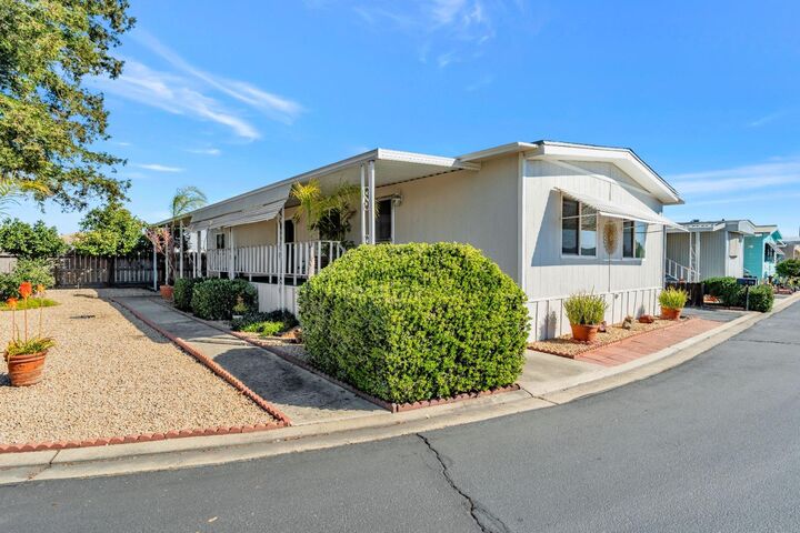 Property Photo:  1830 E Yosemite Avenue 275  CA 95336 