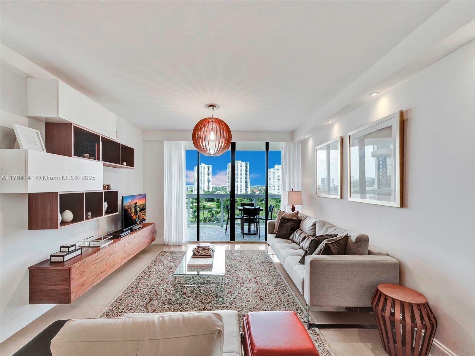 Property Photo: 20185 Country Club Dr 909 FL 33180