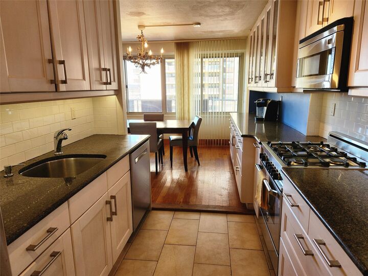 Property Photo: 18-15 215th Street 6 M NY 11360