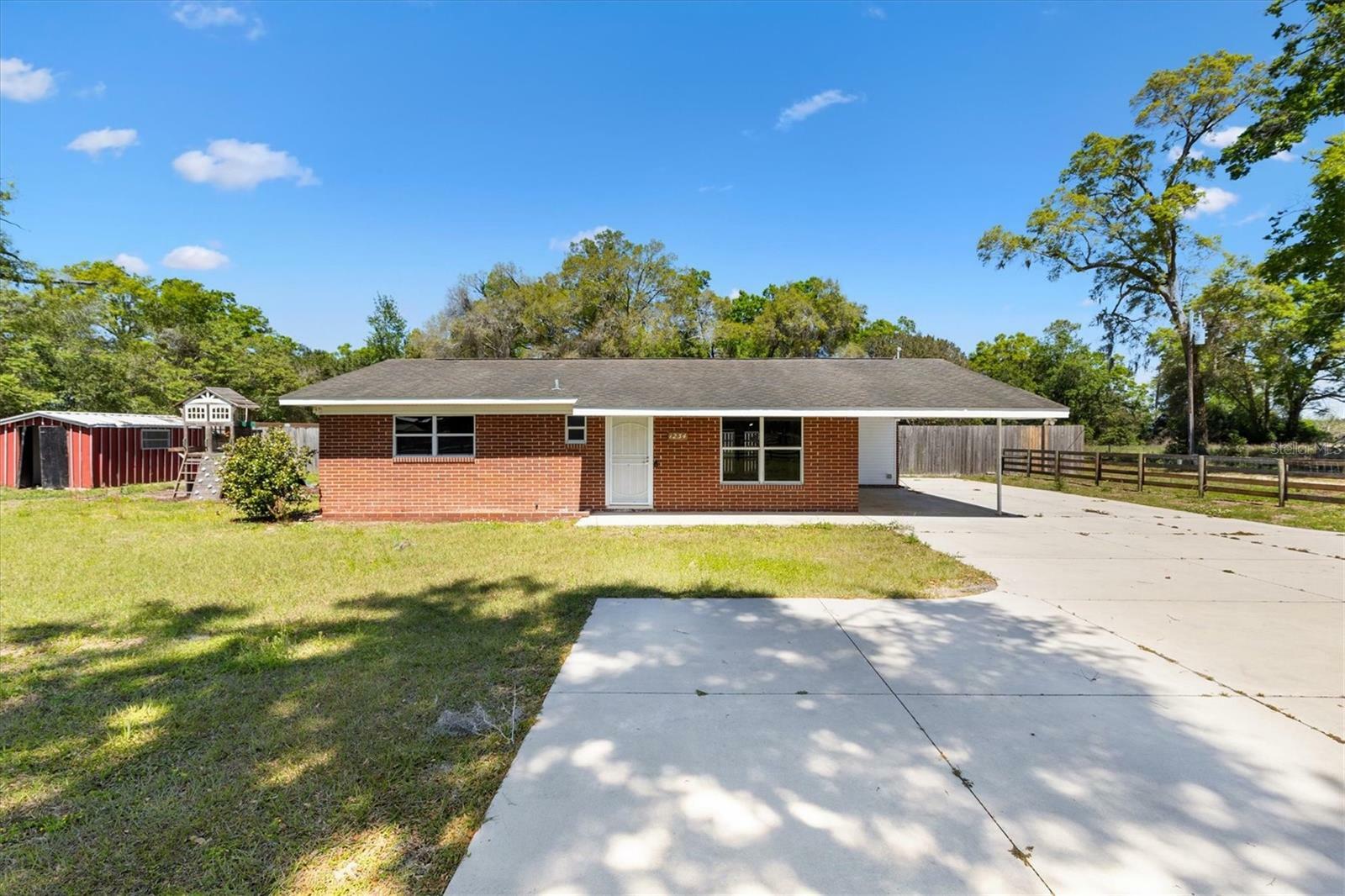 Property Photo: 1234 E C-466 FL 34484