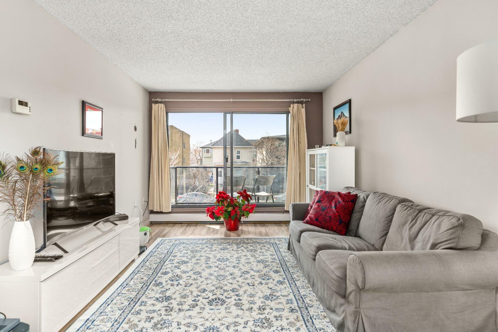 Property Photo: 1602 11 Avenue SW 217 AB T3C 0N2