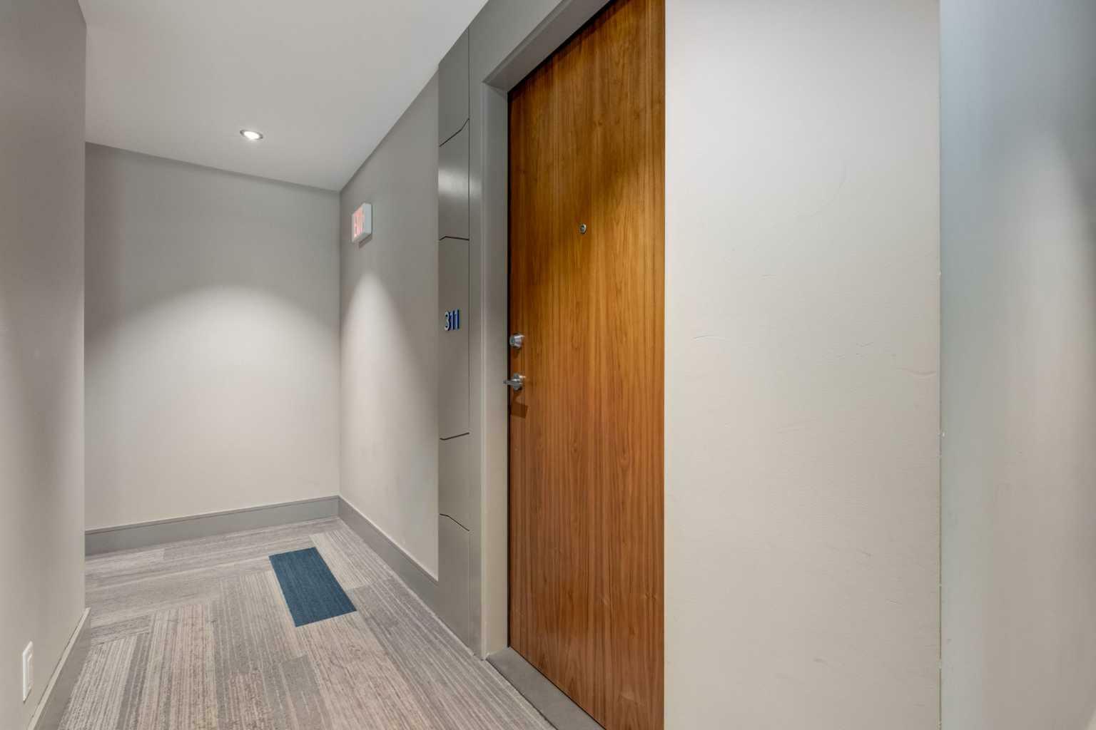 Property Photo:  138 Waterfront Court SW 311  AB T2P 1L1 