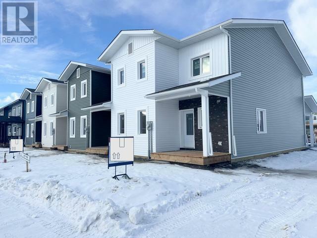 Property Photo:  223 Witch Hazel Drive  YT Y1A 5W5 