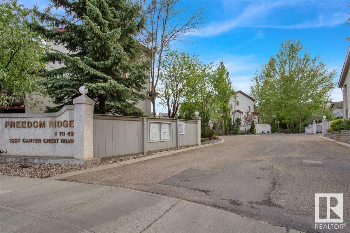 Property Photo:  1237 Carter Crest Road NW 6  AB T6R 2L6 