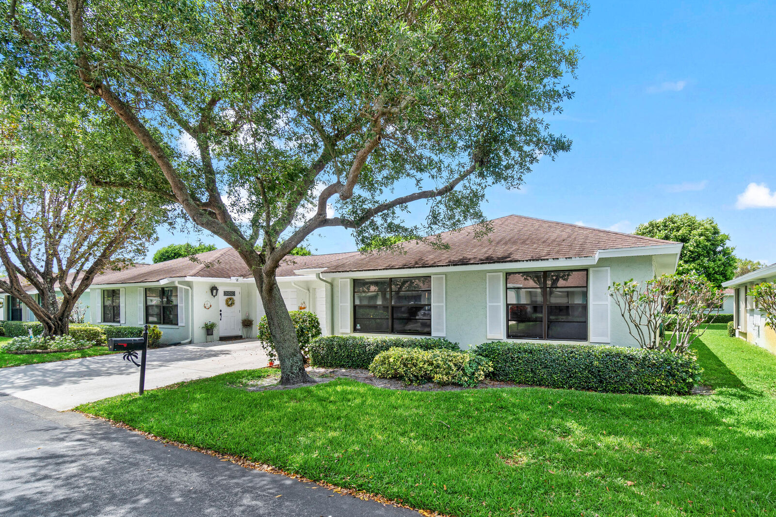 Property Photo:  9975 Ligustrum Tree Way B  FL 33436 