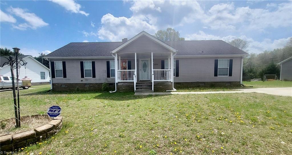 Property Photo: 5514 Red Cedar Court NC 27301