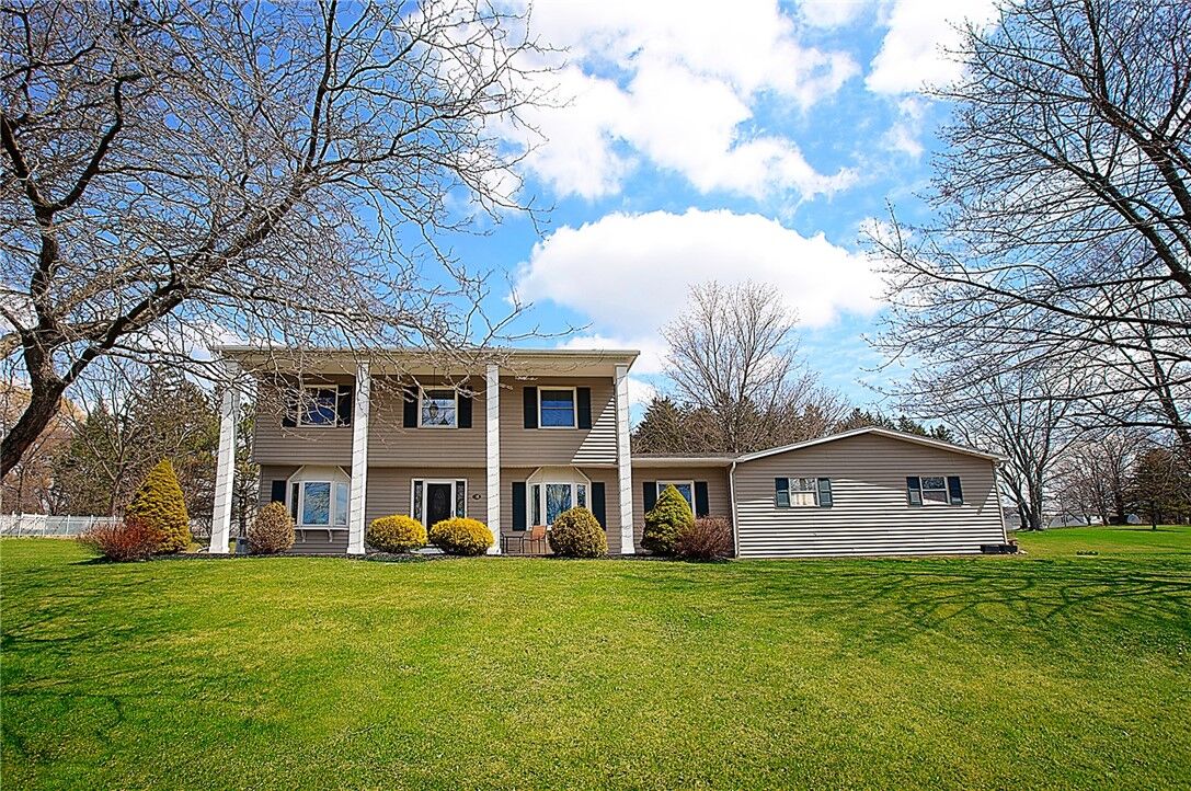 Property Photo: 718 White Springs Drive NY 14456