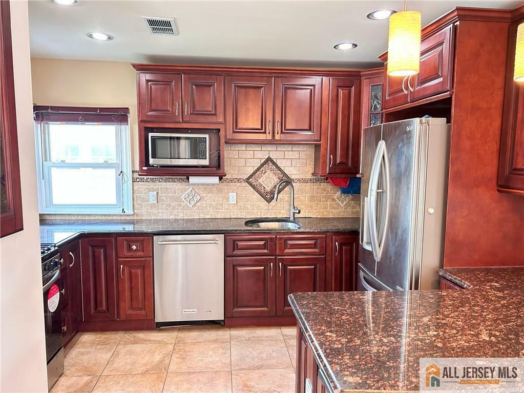 Property Photo: 130 Bedford Avenue NJ 08830