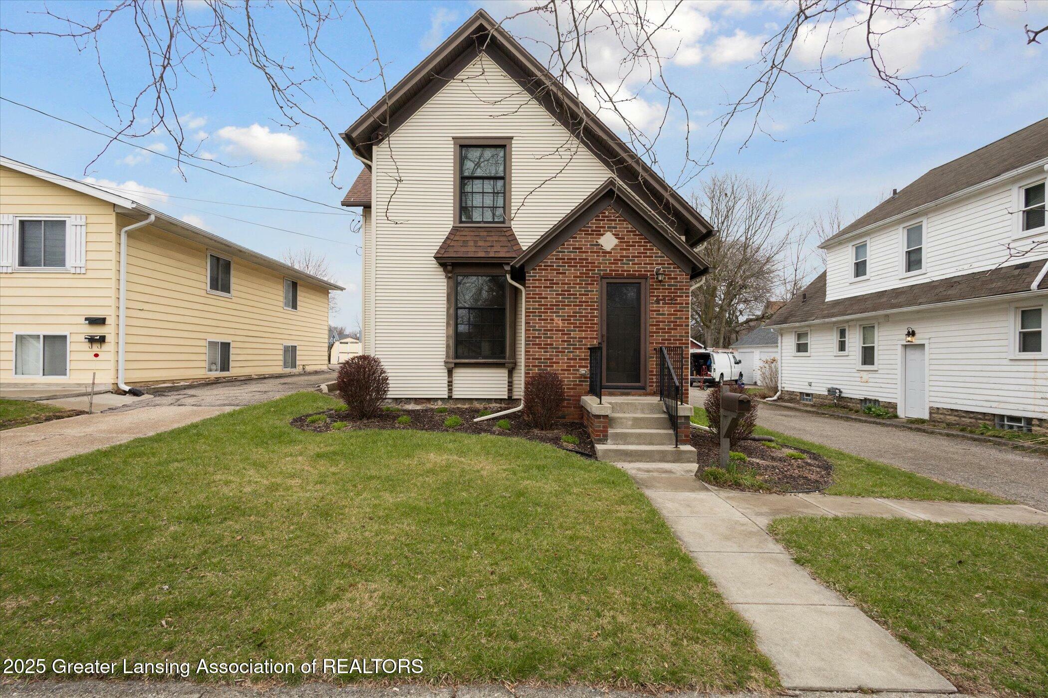 Property Photo: 412 W Madison Street MI 48906
