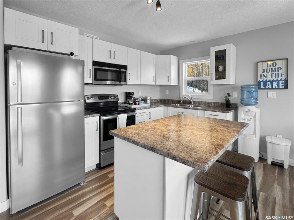 Property Photo: 8921 Hunts Cove Crescent SK S0M 0L0