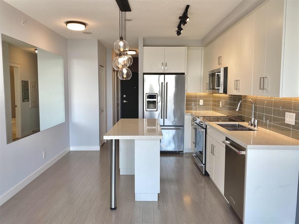 Property Photo: 11967 80 Avenue 1610 BC V4C 0E2