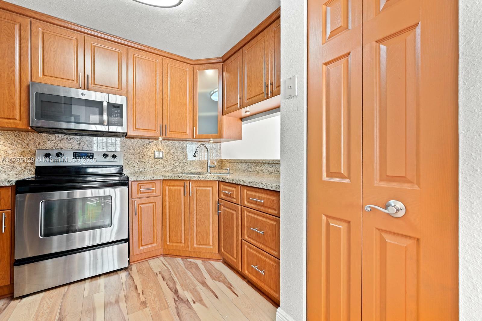 Property Photo: 20155 E Oakmont Cir FL 33015