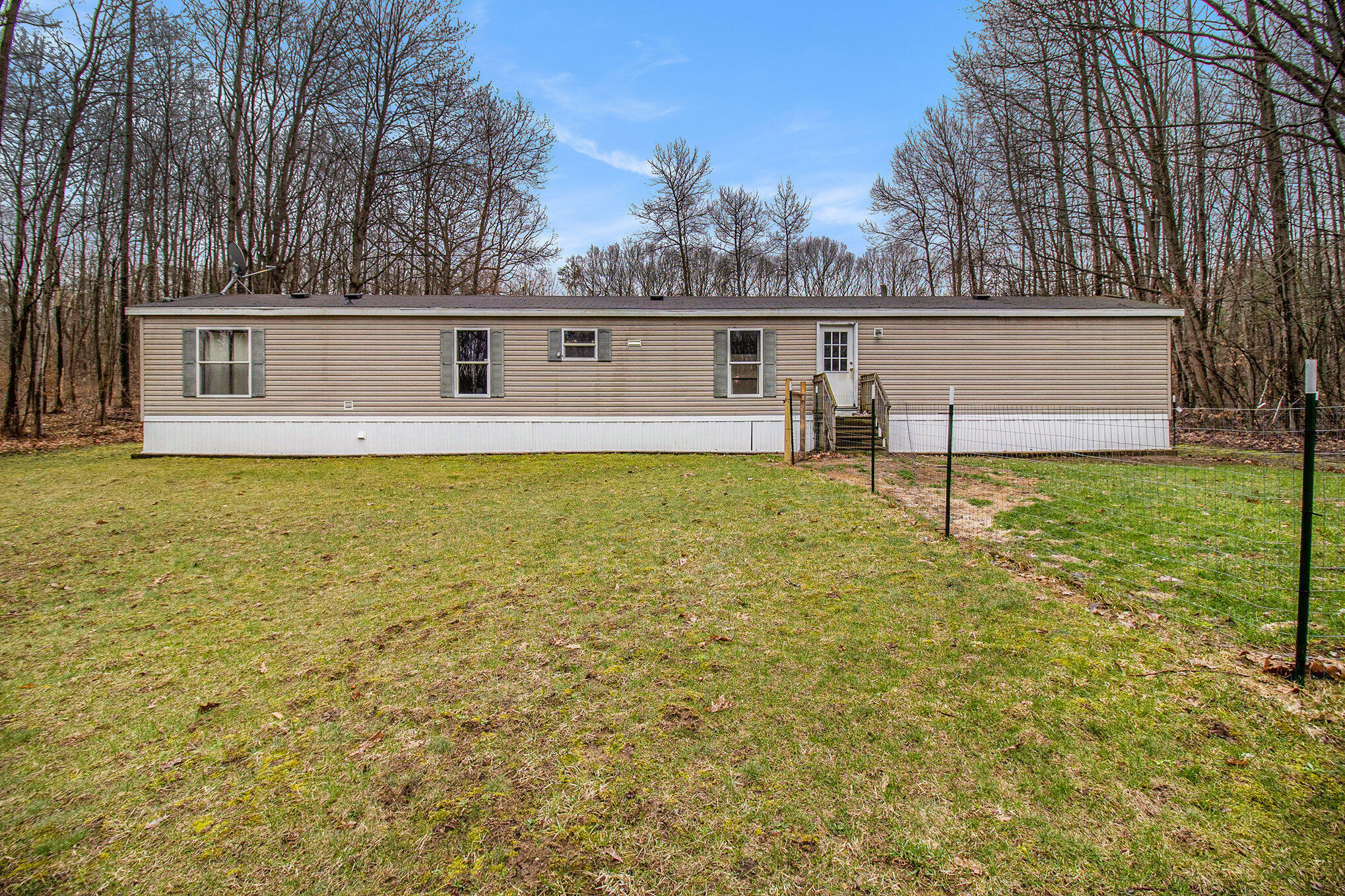 Property Photo:  7607 8 Mile Road  MI 49421 