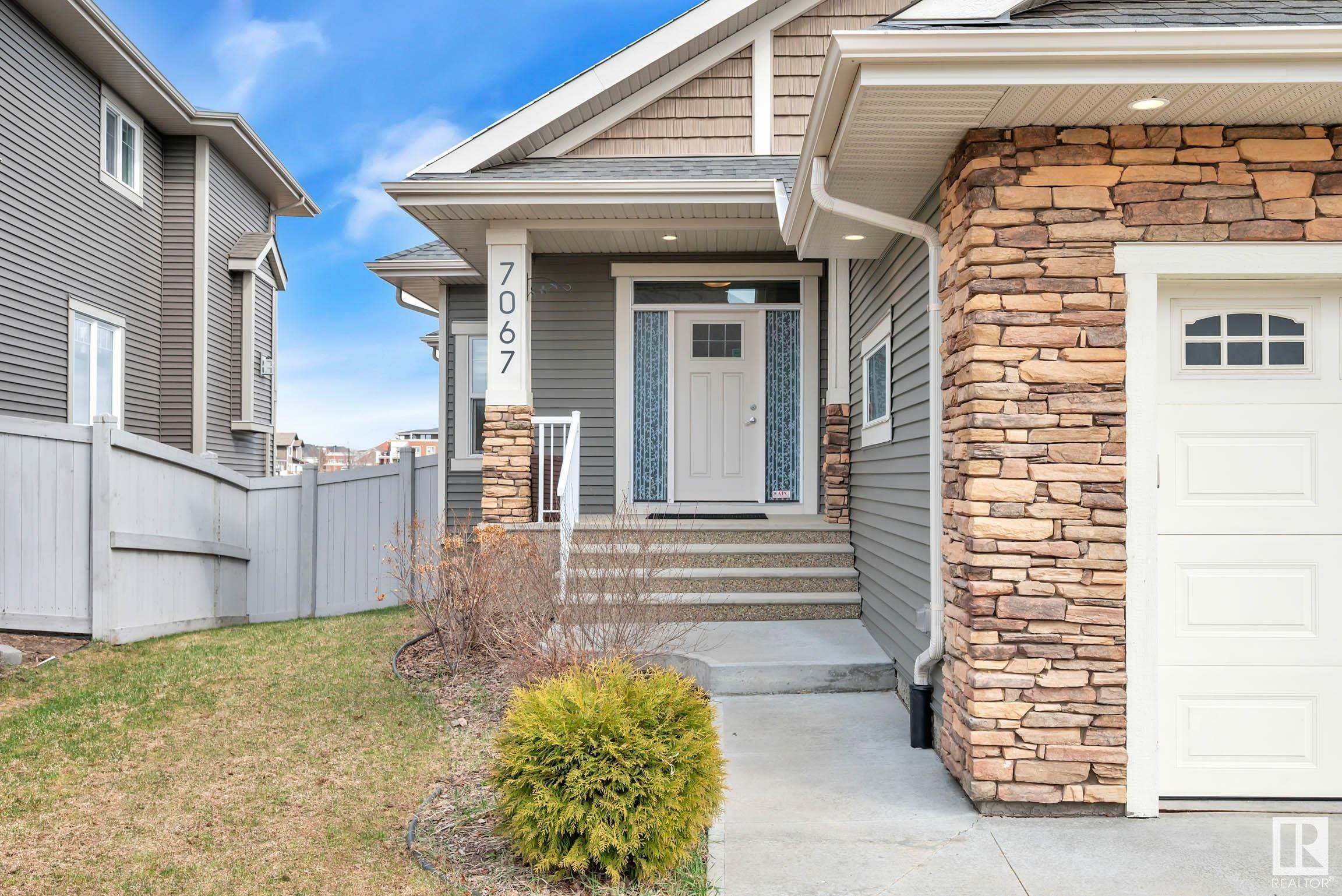 Property Photo: 7067 Newson Road NW AB T5E 6V6