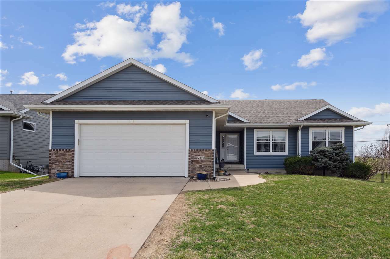 Property Photo: 207 Cherry Park Dr NW IA 52405