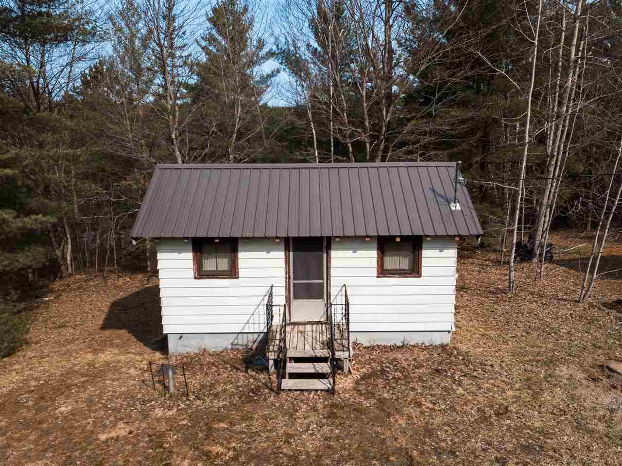 Property Photo:  11457 NE Starvation Lake  MI 49659 