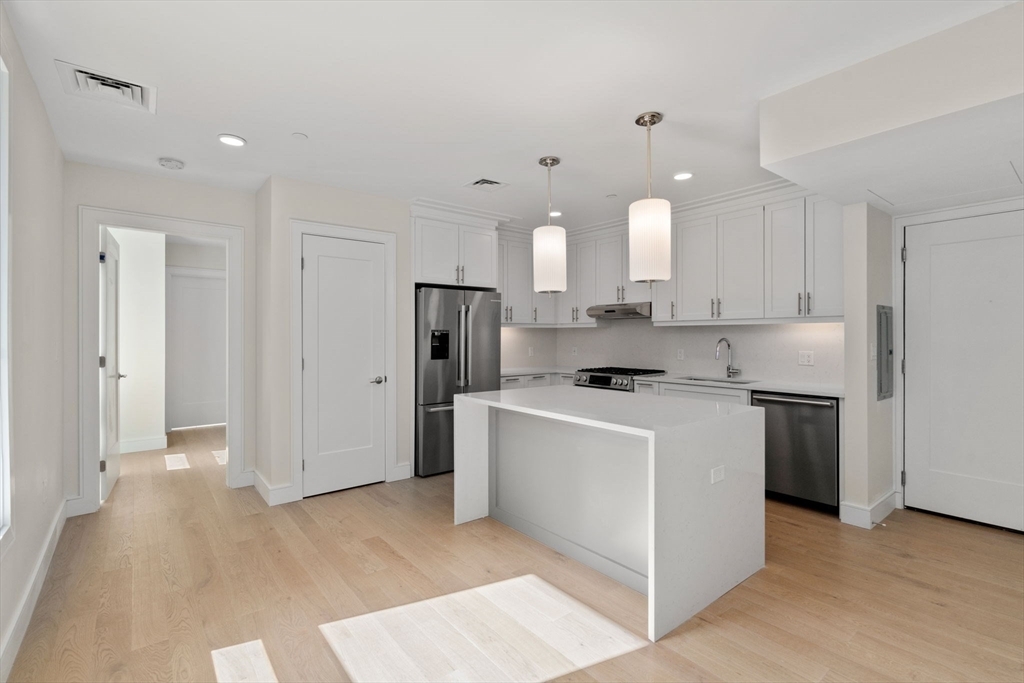 Property Photo: 301 Border 303 MA 02128