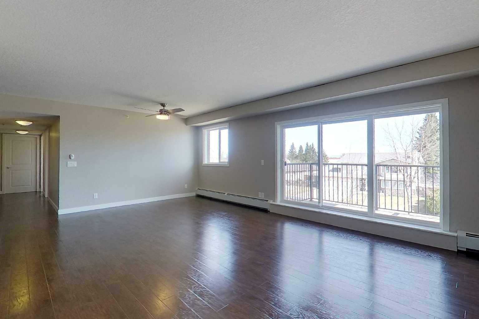 Photo de la propriété: 709 6 Avenue SE 308 AB T0G 2A3