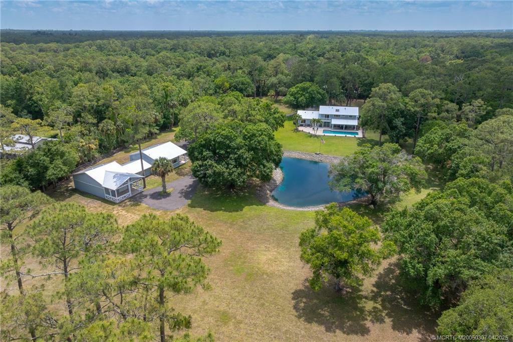 Property Photo: 6955 SW Woodbine Way FL 34990