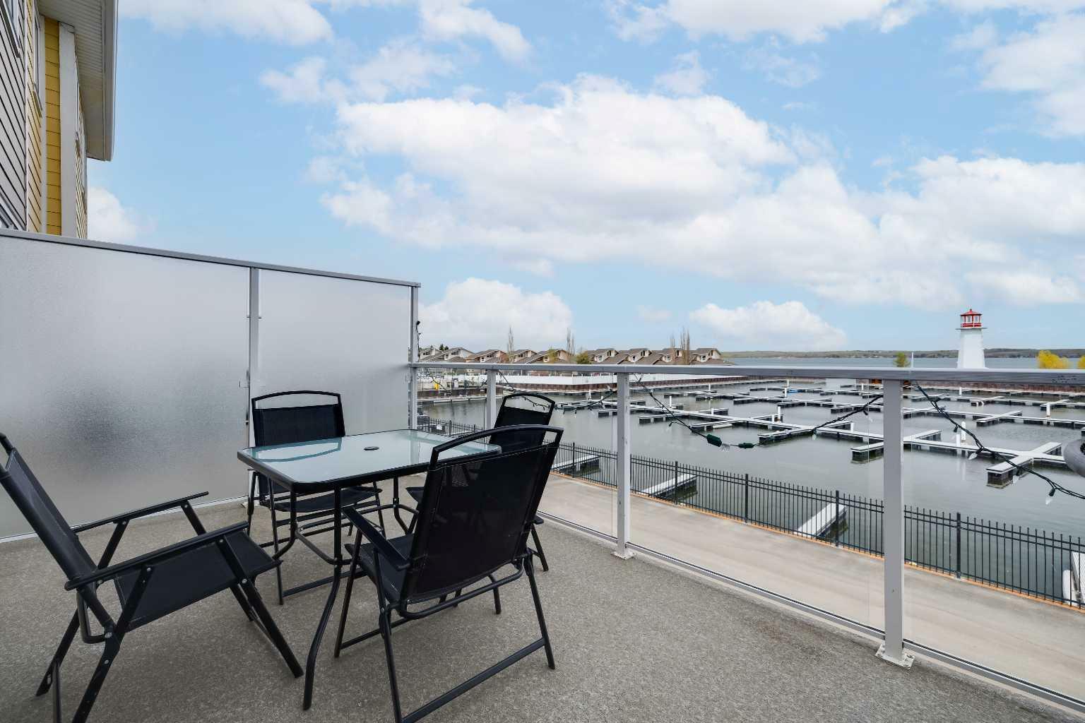 Property Photo: 5210 Lakeshore Drive 103 AB T4S 0M6