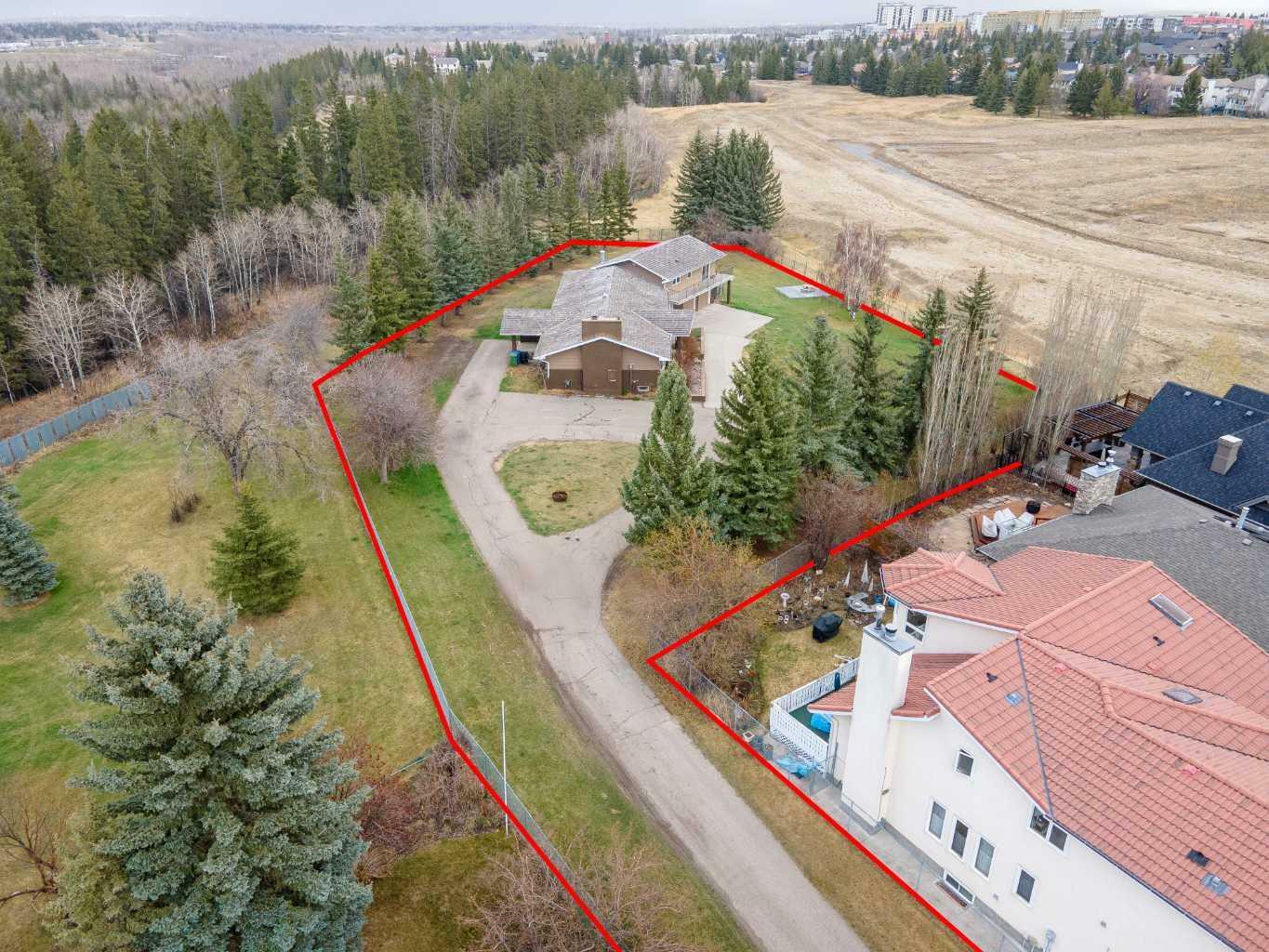 Property Photo: 1008 Shawnee Drive SW AB T2Y 2T9