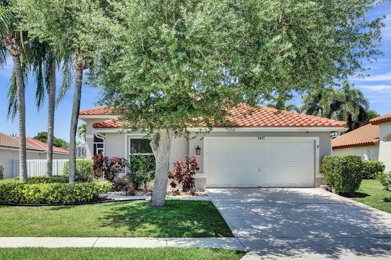 Property Photo: 6057 Kemper Lakes Drive FL 33463
