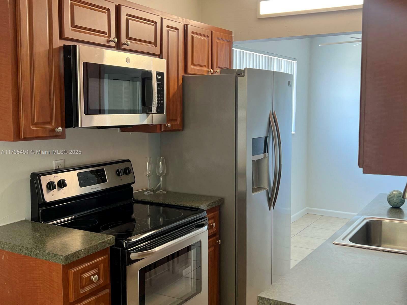 Property Photo: 1100 NE 1st Ct 318 FL 33009