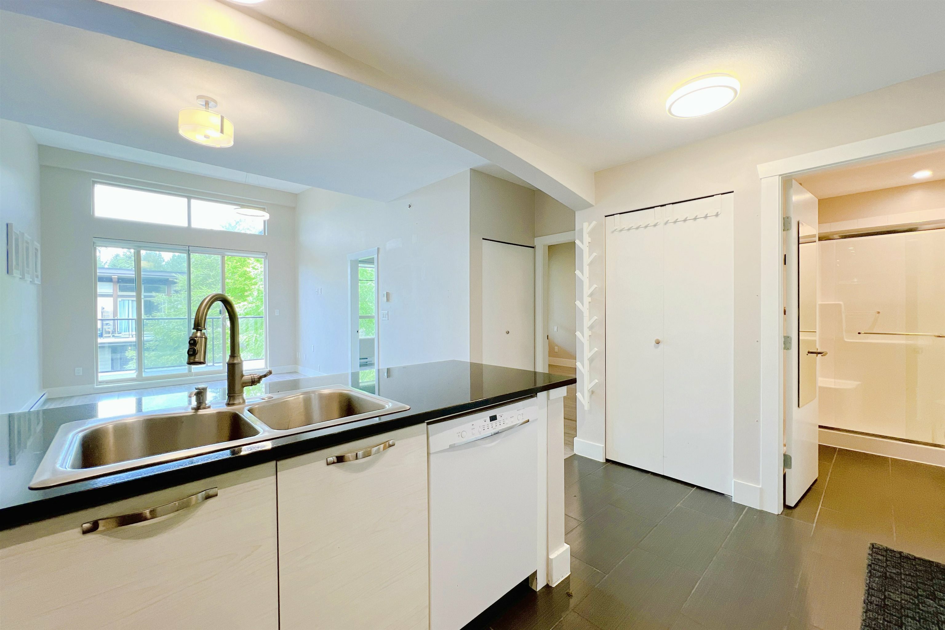 Property Photo: 7488 Byrnepark Walk 405 BC V3N 0B6