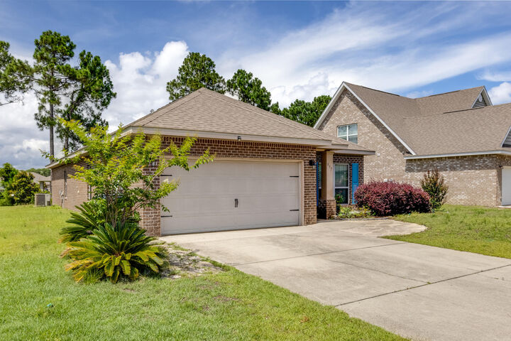 Property Photo: 897 Cocobolo Drive FL 32459