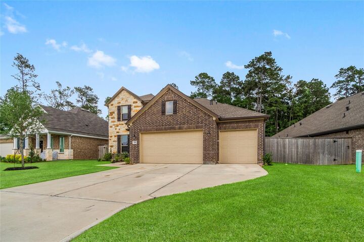 Property Photo: 719 Ivory Creek Court TX 77378