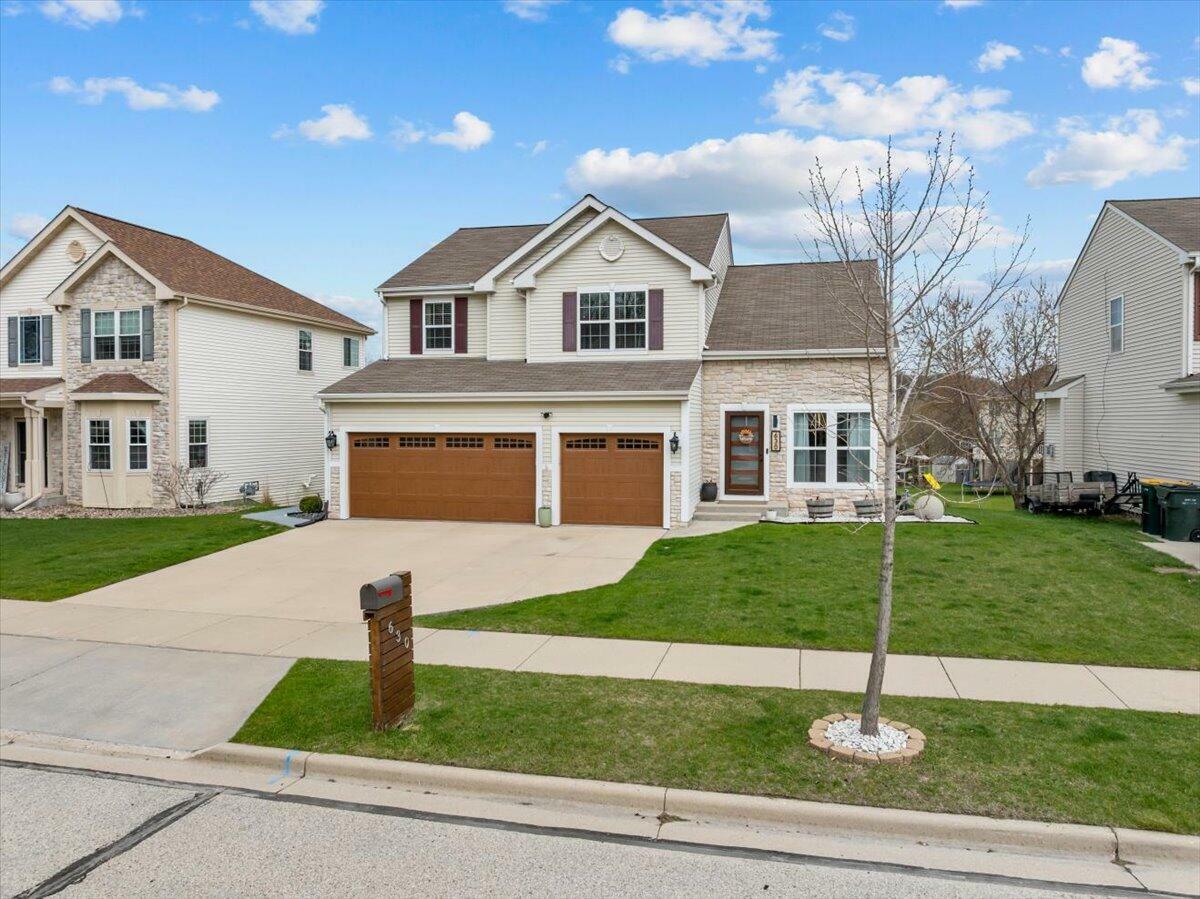 Property Photo: 630 Polaris St WI 53095