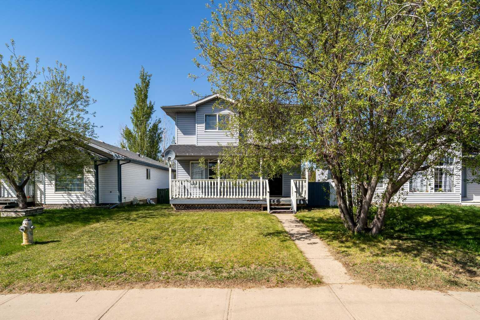 Property Photo: 144 Pleasant Park Road W AB T1R 1H5