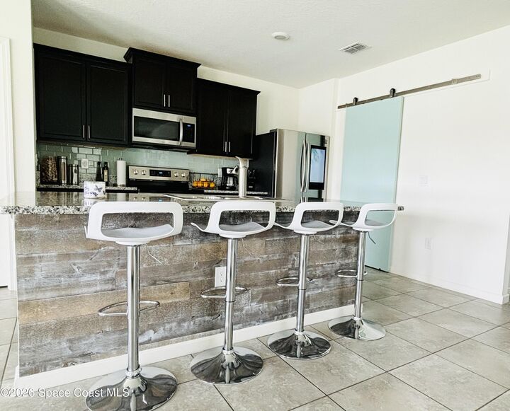 Property Photo:  841 Old Country Road SE  FL 32909 