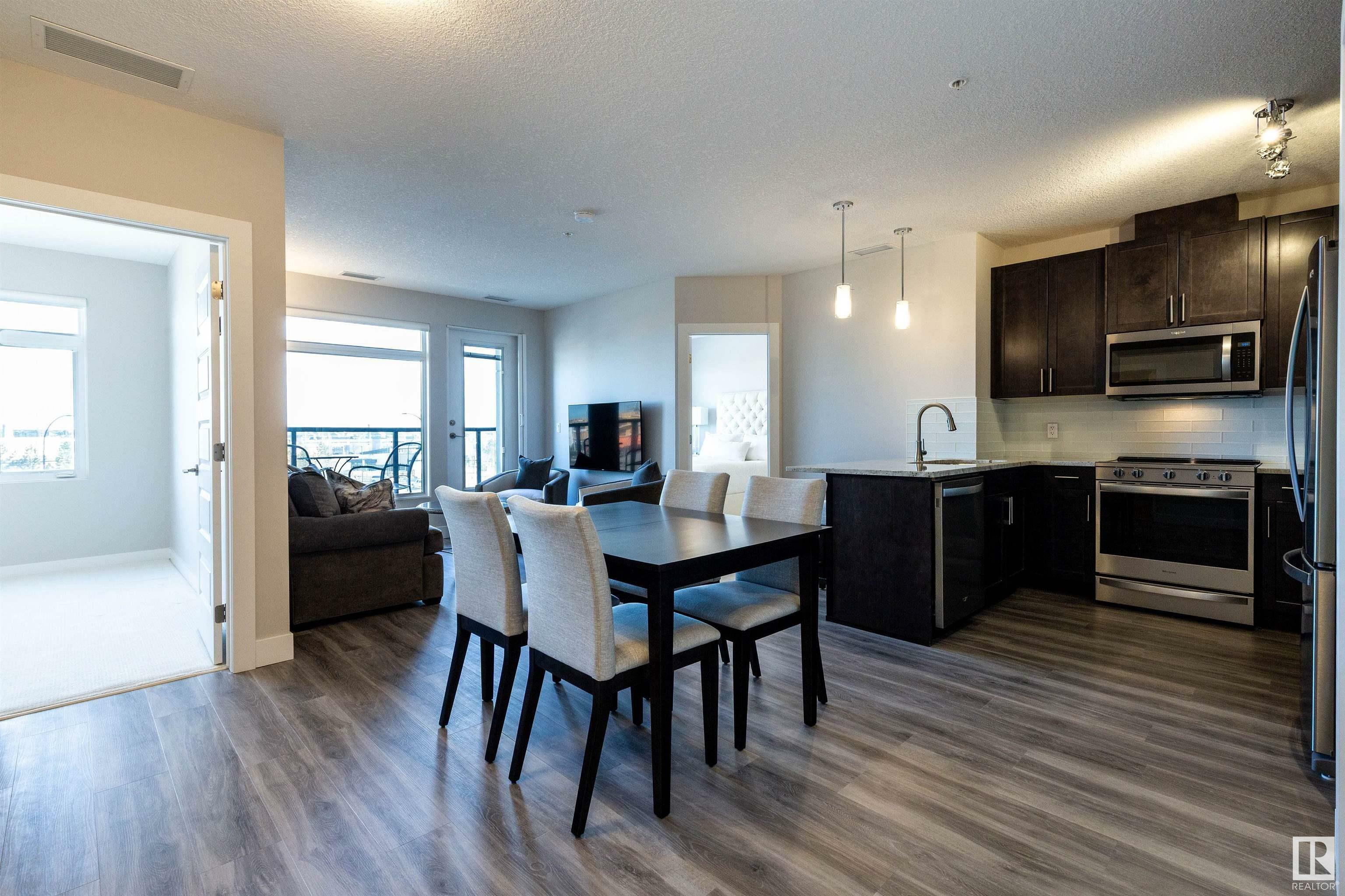 Property Photo: 5151 Windermere Boulevard SW 430 AB T6W 2K4