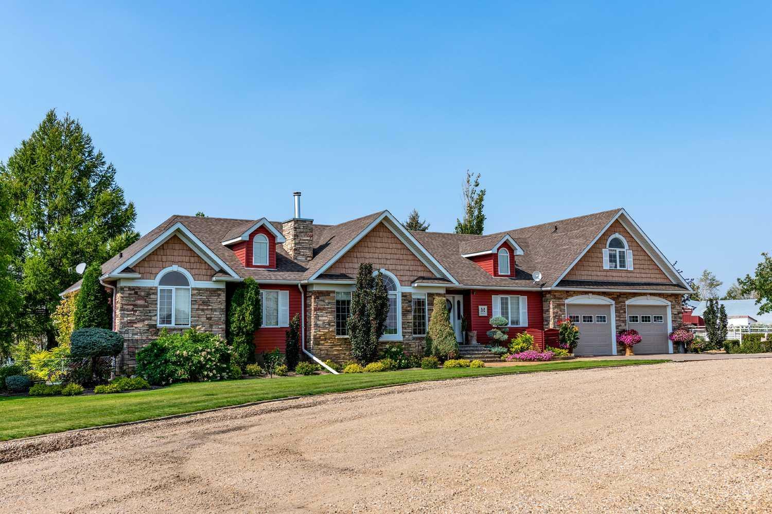 Property Photo: 451066 Rge Rd 73 AB T9W 1T4