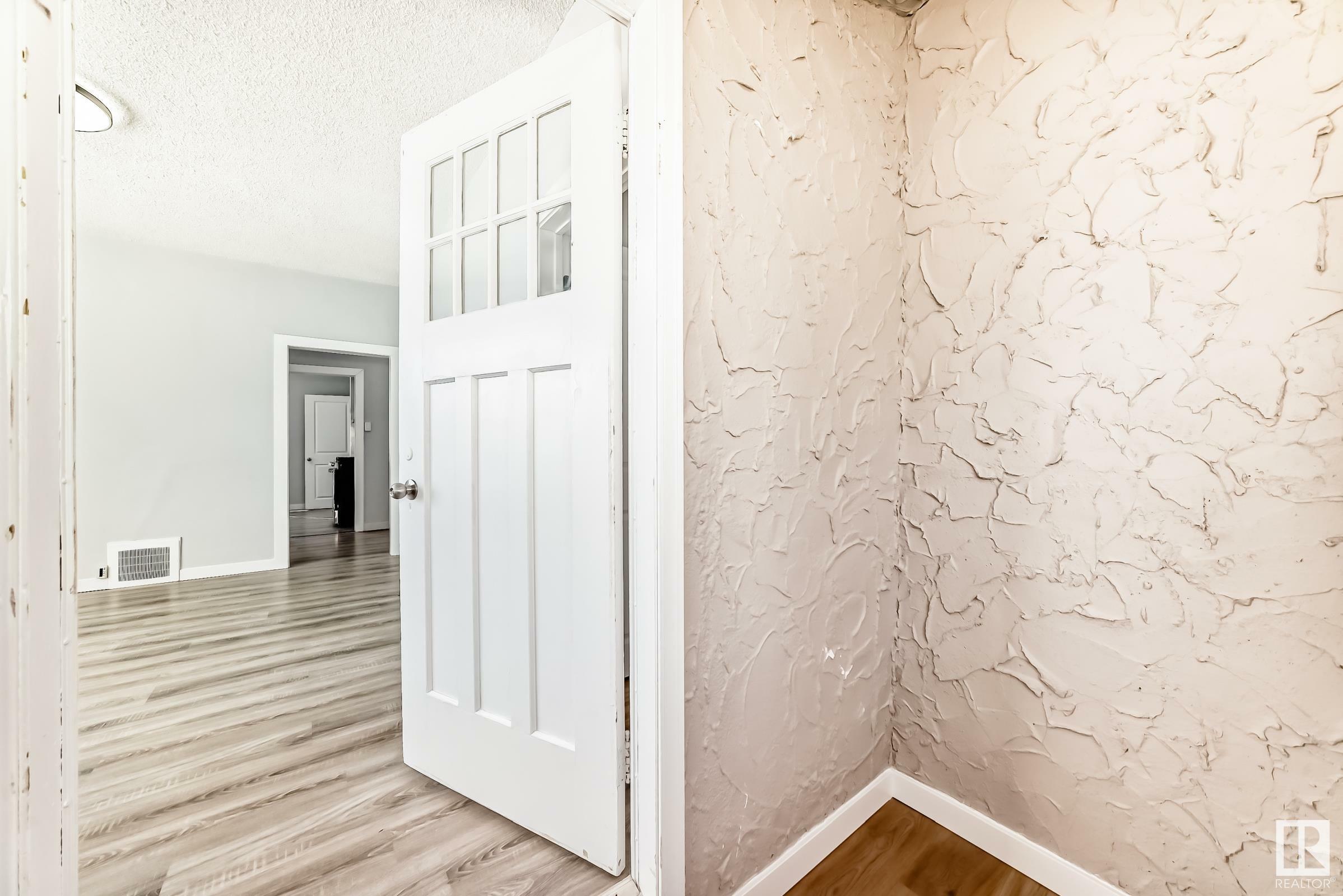 Property Photo:  11902 90 Street NW  AB T5B 3Y9 